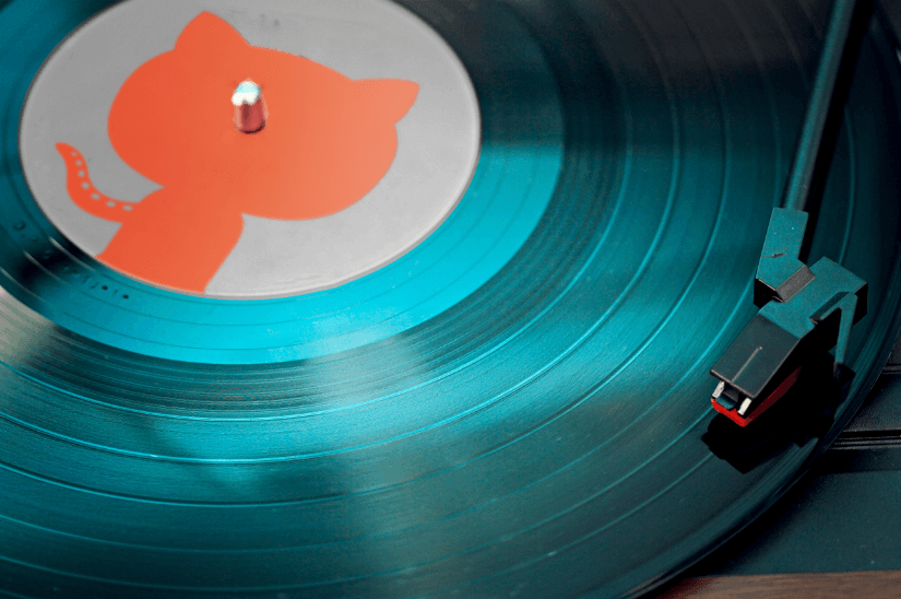 A Close Up Photo of a custom record on a record player